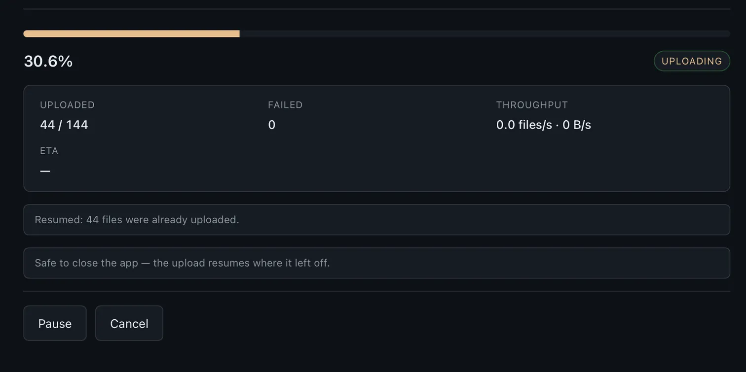 Desktop app uploading the compressed batch at 30 percent with a resumable progress bar