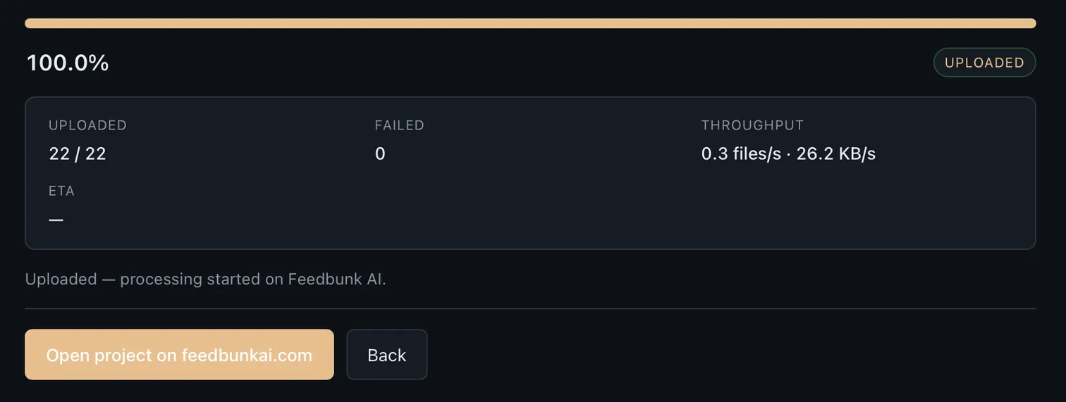 Desktop app showing upload complete at 100 percent with an Open project on feedbunkai.com button